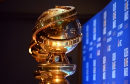 (FILES) In this file photo taken on December 9, 2019, Golden Globe statues are set by the stage ahead of the 77th Annual Golden Globe Awards nominations announcement in Beverly Hills. - Next year's Golden Globes will take place on February 28,  said the Hollywood Foreign Press Association in a statement on June 22, 2020, an unusually late date for the glitzy film and television award show as Hollywood scrambles to adjust to the coronavirus pandemic.  The Globes, which are typically held in early January, will take the weekend previously reserved for the Oscars, which last week were delayed by eight weeks to April 25. (Photo by Robyn BECK / AFP)