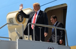 US President Donald Trump and Arizona Governor Doug Ducey disembark from Air Force One upon arrival at Phoenix Sky Harbor International Airport in Phoenix, Arizona, June 23, 2020. (Photo by SAUL LOEB / AFP)