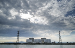This picture taken on June 26, 2020, shows Fessenheim nuclear powerplant in Fessenheim, eastern France. - France will start closing its oldest atomic power plant after 43-years in operation, the first in a series of reactor shutdowns but hardly a signal the country will reduce its reliance on nuclear energy anytime soon. (Photo by SEBASTIEN BOZON / AFP)