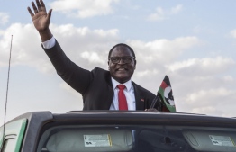 (FILES) In this file photo taken on June 20, 2020, Malawi’s main opposition Malawi Congress Party, MCP, Leader Lazarus Chakwera who is leading the Tonse Alliance in the Presidential elections due on June 23, arrives at Mtandire locations in the suburb of the capital Lilongwe to hold his final rally. Chakwera on June 27, 2020 was declared winner of this week's presidential election re-run with 58.75 percent of the vote according to the electoral commission said, AFP reports. PHOTO/AFP