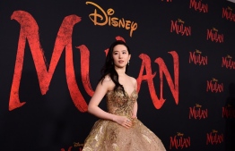 (FILES) In this file photo taken on March 09, 2020 US-Chinese actress Yifei Liu attends the world premiere of Disney's "Mulan" at the Dolby Theatre in Hollywood. (Photo by FREDERIC J. BROWN / AFP)