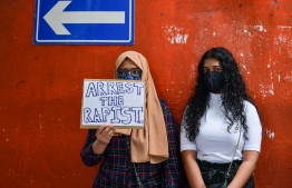 Protestors holding signboards during a demonstration demanding justice for victims of sexual assault. PHOTO: NISHAN ALI/ MIHAARU