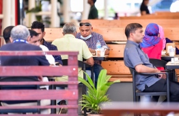 Residents of capital Male' seen at an outlet at the Male' Food Court. PHOTO: NISHAN ALI / MIHAARU