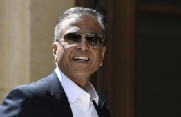 (FILES) In this file photo taken on May 15, 2019 Sunil Bharti Mittal Founder and Chairman of India's Bharti Enterprises arrives ahead of a "Tech For Good" meetup at Hotel Marigny in Paris. - The UK government and Indian telecoms giant Bharti are to take control of collapsed satellite firm Oneweb, they said Friday, July 3, as Britain seeks to expand its post-Brexit space capability. (Photo by Bertrand GUAY / AFP)