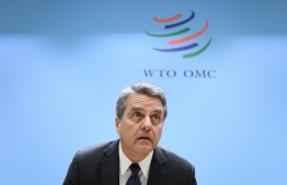 (FILES) In this file photo taken on December 10, 2019 World Trade Organization (WTO) Director General Roberto Azevedo arrives to address a press conference following a WTO general council meeting at the intergovernmental organization's headquarters in Geneva. - Five candidates are vying to become the next head of the World Trade Organization -- an institution which was facing mammoth challenges even before the pandemic-driven global economic crisis struck. The window to enter the race slams shut on July 8, 2020, in a speeded-up contest to replace the outgoing WTO director-general Roberto Azevedo -- the Brazilian career diplomat who is stepping down one year early at the end of August. (Photo by Fabrice COFFRINI / AFP)