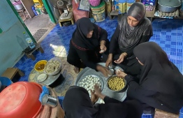 A group of women prepare food. PHOTO: UTHEMA