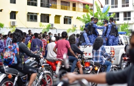 Maldives Police Service at the scene of the protest held by migrant workers demanding for repatriation. PHOTO: MIHAARU