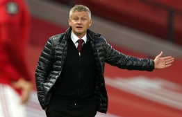 Manchester United's Norwegian manager Ole Gunnar Solskjaer gestures on the touchline during the English Premier League football match between Manchester United and Southampton at Old Trafford in Manchester, north-west England, on July 13, 2020. (Photo by Dave Thompson / POOL / AFP)