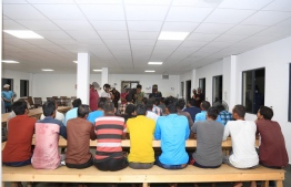 Supervisors conducting negotiations with expatriate workers that led a demonstration in Vaavu Atoll. PHOTO: POLICE