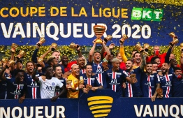 Paris Saint-Germain lifted the French League Cup against Lyon. PHOTO: AFP