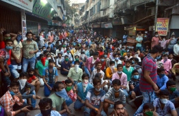 After the Indian government imposed a strict and sudden lockdown, jobless migrant laborers in the city of Surat in western India gathered in April to demand transportation to their villages.