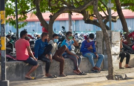 People pictured outside wearing face masks, as daily life continues in the 'new normal'. PHOTO: AHMED AWSHAN ILYAS / MIHAARU