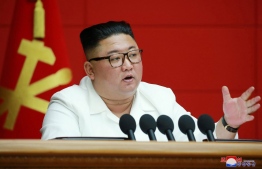 This picture taken on August 19, 2020 and released from North Korea's official Korean Central News Agency (KCNA) on August 20, 2020 shows North Korean leader Kim Jong Un speaking at the 6th Plenary Meeting of the 7th Central Committee of the Workers' Party of Korea at the office building of the Central Committee of the Party in Pyongyang. (Photo by STR / KCNA VIA KNS / AFP) / - South Korea OUT / ---EDITORS NOTE--- RESTRICTED TO EDITORIAL USE - MANDATORY CREDIT "AFP PHOTO/KCNA VIA KNS" - NO MARKETING NO ADVERTISING CAMPAIGNS - DISTRIBUTED AS A SERVICE TO CLIENTS / THIS PICTURE WAS MADE AVAILABLE BY A THIRD PARTY. AFP CAN NOT INDEPENDENTLY VERIFY THE AUTHENTICITY, LOCATION, DATE AND CONTENT OF THIS IMAGE --- / 