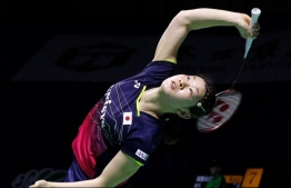 Japan's Ayaka Takahashi goes full stretch to play a shot in her Women's Doubles quarter-final at the Thaihot China Open. Takahashi and Misaki Matsutomo entered the semi-finals beating Malaysia's Amelia Anscelly and Soon Fie Cho 21-17 21-12. PHOTO: BADMINTONPHOTO