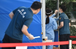 South Korea tightened social distancing rules in the capital and the surrounding regions this week as authorities scrambled to contain a resurgence of the virus. PHOTO AFP
