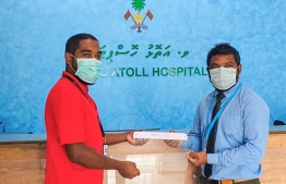 During the hand over ceremony of face shields to the Vaavu Atoll Hospital in Felidhoo. PHOTO: BANK OF MALDIVES