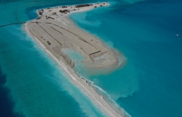 An aerial photograph of the ongoing Gulhifalhu reclamation in the Greater Male' Region. The mega development project aims to connect Capital city Male' with connective bridges to the industrial isalnd, as well as the neighbouring Vilimale' and waste management island Thilafushi. Mega infrastructural projects by the previous administration was often scrutinized by the current ruling party. However, upon coming to power in 2018, the incumbent administration has continually doubled down on mass 'ecocide', in violation of the electoral pledges by President Ibrahim Mohamed Solih. PHOTO: SAVE MALDIVES