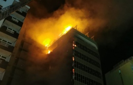 The penthouse of the SBI building on fire. PHOTO: MIHAARU