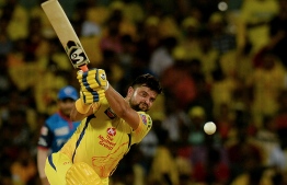 (FILES) In this file photo taken on May 1, 2019 Chennai Super Kings cricketer Suresh Raina plays a shot during the 2019 Indian Premier League (IPL) Twenty20 cricket match between Chennai Super Kings and Delhi Capitals at the M.A. Chidambaram Stadium in Chennai. - Chennai Super Kings on August 29, 2020 lost key batsman Suresh Raina for the Indian Premier League tournament because of "personal reasons", a day after it became the first team to report players with coronavirus. (Photo by ARUN SANKAR / AFP) / ----IMAGE RESTRICTED TO EDITORIAL USE - STRICTLY NO COMMERCIAL USE-----