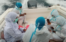 A sampling team travelling between Hoadehdhoo and Madaveli. 