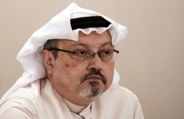 (FILES) In this file photo taken on December 15, 2014, Saudi journalist Jamal Khashoggi attends a press conference in the Bahraini capital Manama. - A Saudi court overturned five death sentences over the 2018 murder of journalist Jamal Khashoggi, a killing which sparked an international outcry, and instead jailed eight defendants to between seven and 20 years, state media reported. (Photo by MOHAMMED AL-SHAIKH / AFP)