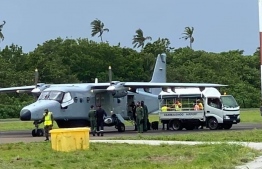 The grounded Indian military surveillance aircraft seen at the Hanimaadhoo International Airport. Crew are seen disembarking the plane. PHOTO: SOCIAL MEDIA 