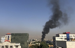 A smoke plume rises following an explosion targeting the convoy of Afghanistan's vice president Amrullah Saleh in Kabul on September 9, 2020. (Photo by Najiba NOORI / AFP)