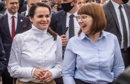 Exiled Belarusian opposition leader Svetlana Tikhanovskaya (L) walks with belarusian oppositionist Olga Kovalkova after a meeting with students at the Warsaw University, Warsaw, on September 9, 2020. (Photo by Wojtek RADWANSKI / AFP)