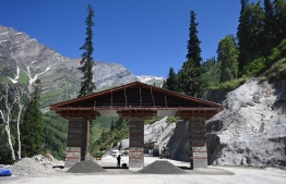 (FILES) In this file photo taken on September 01, 2020 the south portal gate of the Atal Rohtang Tunnel is seen in Dhundi village near Solang in Himachal Pradesh state. - India's Prime Minister Narendra Modi on October 3 opened a Himalayan tunnel that will drastically reduce the time needed to rush troops to the country's remote Chinese border as tensions grow between the Asian neighbours. (Photo by Money SHARMA / AFP)