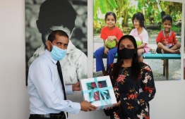 Local Non-Profit 'Advocating the Rights of Children (ARC) donated the 300 clear fasks masks during a special ceremony and was received by the Minister of Education Dr Aishath Ali. PHOTO: ARC