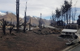 This handout photo taken and released on October 5, 2020 courtesy of Gary Kircher shows damage caused by the South Island wildfires in Lake Ohau. (Photo by Handout / Courtesy of Gary Kircher / AFP) / RESTRICTED TO EDITORIAL USE - MANDATORY CREDIT "AFP PHOTO / Courtesy of Gary Kircher" - NO MARKETING NO ADVERTISING CAMPAIGNS - DISTRIBUTED AS A SERVICE TO CLIENTS --- NO ARCHIVES ---