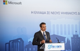 Greek Prime Minister Kyriakos Mitsotakis gives a speech as he attends a ceremony with the President of Microsoft in the Acropolis Museum in Athens on October 5, 2020. - Greece and Microsoft announced an investment deal worth up to a billion euros ($1.2 billion) to build cloud storage infrastructure in the country. The announcement comes as Greece's pro-business government plans to gradually shift the country's notoriously bureaucratic civil service online. (Photo by ANGELOS TZORTZINIS / AFP)