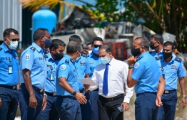 Minister of Home Affairs Imran Abdulla pictured with seniors of Maldives Police Service. Association Democracy Maldives called on the government to ratify the Maldives Police Act without delays. PHOTO: MIHAARU