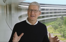 (FILES) In this file photo taken on September 15, 2020 a handout still image from the keynote video released by Apple inc. shows Apple CEO Tim Cook kicks off a special event at Apple Park in Cupertino, California. - Apple is expected on October 13, 2020, to unveil a keenly anticipated iPhone 12 line-up starring models tuned to super-fast new 5G telecom networks in an update considered vital to the company's fortunes. (Photo by Handout / Apple Inc. / AFP)