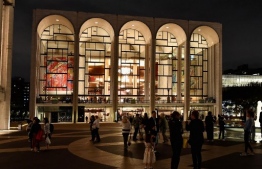 (FILES) In this file photo a view of the Metropolitan Opera at Lincoln Center for the Performing Arts is seen on October 5, 2018 in New York City. - Recent weeks have seen the already painful situation facing live performance in the United States grow increasingly dire, with major companies along with Broadway somberly scrapping hope to re-open before summer 2021 and scrambling to find ways to stay in the public eye. New York's Metropolitan Opera was the first top outfit to cancel its entire 2020-21 season over the coronavirus pandemic, followed by the highly bankable Broadway theater district and the city's famed Philharmonic symphony. (Photo by Angela Weiss / AFP)
