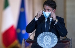 Italian Prime Minister Giuseppe Conte at a press conference held in 2020, to present new measures to tackle the spread of the Covid-19 disease caused by the coronavirus. PHOTO: AFP / ANSA