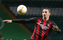 AC Milan's Swedish forward Zlatan Ibrahimovic controls the ball during the UEFA Europa League 1st round group H football match between Celtic and AC Milan at Celtic Park stadium in Glasgow, Scotland on October 22, 2020. (Photo by RUSSELL CHEYNE / POOL / AFP)