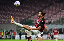 AC Milan's Swedish forward Zlatan Ibrahimovic controls the ball during the Italian Serie A football match between AC Milan and AS Roma at the Meazza Stadium in Milan on October 26, 2020. (Photo by MIGUEL MEDINA / AFP)