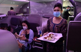 Travel buffs choose to soothe wanderlust by dining in a grounded Singapore Airlines plane. PHOTO: SINGAPORE AIRLINES