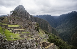 View of the archaeological site of Machu Picchu, in Cusco, Peru during its reopening ceremony on November 01, 2020, amid the new coronavirus pandemic. - The Inca citadel of Machu Picchu reopened on Sunday in the framework of a gradual decrease in COVID-19 contagions in Peru, after remaining empty almost eight months, affecting the tourism sector severely (Photo by ERNESTO BENAVIDES / AFP)