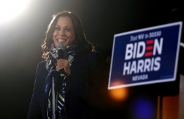 (FILES) In this file photo taken on October 27, 2020 Senator from California and Democratic vice presidential nominee Kamala Harris speaks during a voter mobilization event in Las Vegas. - Joe Biden has won the US presidency over Donald Trump, TV networks projected on November 7, 2020, a victory sealed after the Democrat claimed several key battleground states won by the Republican incumbent in 2016. CNN, NBC News and CBS News called the race in his favor, after projecting he had won the decisive state of Pennsylvania. His running mate, US Senator Kamala Harris, has become the first woman US Vice President elected to the office. (Photo by Ronda Churchill / AFP)