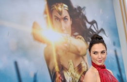 This photo taken on May 25, 2017 shows actress Gal Gadot at the world premiere of "Wonder Woman" at the Pantages in Hollywood, California. - The much-delayed Warner Bros. superhero sequel "Wonder Woman 1984" will premiere on HBO Max and in theaters simultaneously from Christmas Day in the United States, the studio announced November 18. (Photo by Chris DELMAS / AFP)