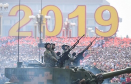 (FILES) In this file photo taken on October 1, 2019 Military vehicles take part in a military parade at Tiananmen Square in Beijing, to mark the 70th anniversary of the founding of the People’s Republic of China. US and Chinese companies dominated the global arms market in 2019, while the Middle East made its first appearance among the 25 biggest weapons manufacturers, a report by the SIPRI research institute said on December 7, 2020.
The US arms industry accounted for 61 percent of sales by the world's "Top 25" manufacturers last year, ahead of China's 15.7 percent, according to the Stockholm International Peace Research Institute.
GREG BAKER / AFP