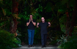 (FILES) In this file photo taken on September 22, 2019 Italian fashion designers Stefano Gabbana (L) and Domenico Dolce acknowledge applause following the presentation of their Women's Spring Summer 2020 fashion show presented in Milan. - The coronavirus crisis has upended the norms of the fashion world, but Italian designers Domenico Dolce and Stefano Gabbana believe it has spurred them to be more inventive and resourceful. (Photo by Miguel MEDINA / AFP)