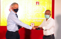 Bank of Maldives conferring awards to the company’s long serving employees. PHOTO: BML