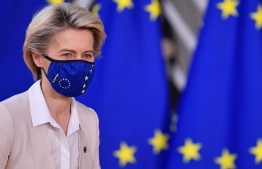 President of the European Commission Ursula von der Leyen arrives at the EU headquarters' Europa building in Brussels on December 10, 2020, prior to a European Union summit. (Photo by JOHN THYS / POOL / AFP)
