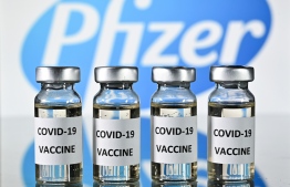 (FILE) An illustration picture shows vials with Covid-19 Vaccine stickers attached, with the logo of US pharmaceutical company Pfizer, on November 17, 2020: although HEOC has said they would start administering Pfizer vaccines this month, they are unsure when the next shipment of the vaccine will arrive in Maldives — Photo: Justin Tallis/ AFP