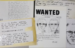 A San Francisco Police Department wanted bulletin and copies of letters sent to the San Francisco Chronicle by a man who called himself Zodiac on display in San Francisco on May 3, 2018. PHOTO: ERIC RISBERG / AP