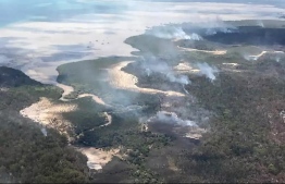 Bushfires that have burned more than half of UNESCO world heritage-listed Fraser Island are suspected to have been started by an illegal campfire Handout QUEENSLAND FIRE AND EMERGENCY SERVICES/AFP/File