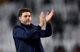 (FILES) This file photo taken on November 6, 2019 shows Tottenham Hotspur's Argentinian head coach Mauricio Pochettino clapping at the end of the UEFA Champions League Group B football match between Red Star Belgrade (Crvena Zvezda) and Tottenham Hotspur at the Rajko Mitic stadium in Belgrade. - Paris Saint-Germain have fired their coach Thomas Tuchel with former Tottenham boss Mauricio Pochettino lined up as his replacement, according to various media reports on December 24, 2020. The French champions declined to make any comment when contacted by AFP to confirm the reports carried by L'Equipe newspaper and RMC and German tabloid Bild. (Photo by ANDREJ ISAKOVIC / AFP)
